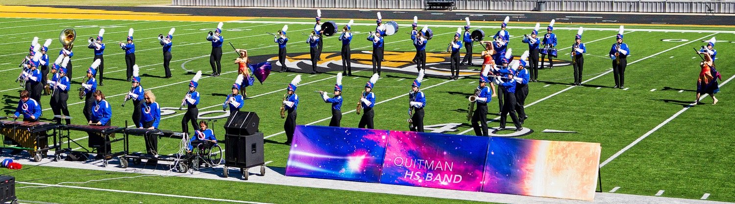 The Quitman Proud Blue Band performs the first movement of its 2022 show "Star Burst" in Mt. Pleasant last Tuesday. [see more marching success]